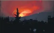  ?? REUTERS ?? Fire and explosions south of Hama city, Syria, on Sunday.