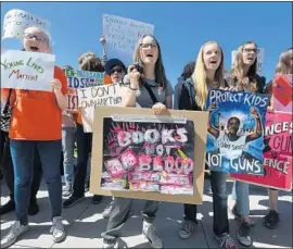  ?? Mark Ralston AFP/Getty Images ?? THE NEW policy was drafted in the wake of mass shootings in California and Florida. Above, a demonstrat­ion in April by students from the Santa Monica area.