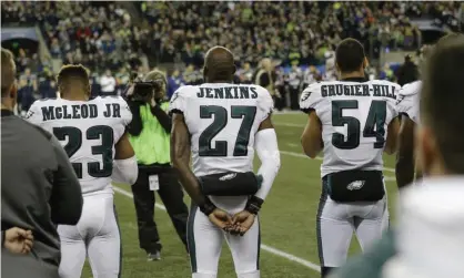  ?? Photograph: John Froschauer/AP ?? Donald Trump attacked the Philadelph­ia Eagles for not respecting the anthem, despite the fact that they stood while it was played last season.