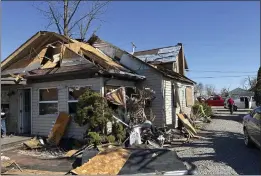  ?? PATRICK ORSAGOS — THE ASSOCIATED PRESS ?? Joe Baker's damaged home is shown Saturday in Valleyview, Ohio. Thursday night's storms left trails of destructio­n across parts of Ohio, Kentucky, Indiana and Arkansas.