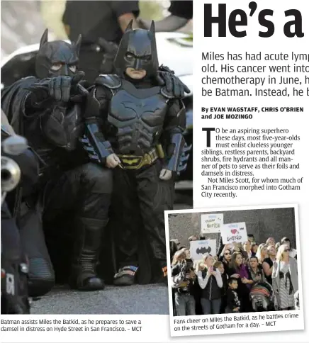  ??  ?? Batman assists Miles the Batkid, as he prepares to save a damsel in distress on Hyde Street in San Francisco. – MCT Fans cheer on Miles the Batkid, as he battles crime on the streets of Gotham for a day. – MCT