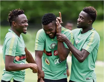  ?? —AFP ?? No laughing matter: (From left) Nigeria forward Ahmed Musa, defender Chidozie Awaziem and midfielder Onyinye Ndidi during a training session at the Essentuki Arena on Tuesday.