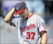  ?? JUSTIN EDMONDS / GETTY IMAGES ?? Nationals right-hander Stephen Strasburg, who started the season 15-1, is 0-3 with a 14.66 ERA in his last three starts.