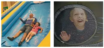  ?? BEJON HASWELL/STUFF ?? Matalei Mohuanga on the slide with daughter Harmony, 3, and Charles Lahaut, 2, has fun on the bouncy castle.