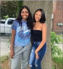  ??  ?? Rylee Curry, left, and Rachel Holt organized the Upper Darby’s March of Young Voices Against Police Brutality.