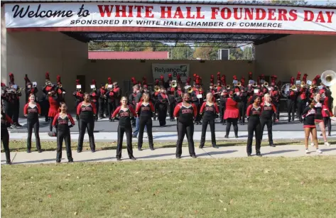  ?? (Special to The Commercial/Deborah Horn) ?? The White Hall Marching Band and Pep Squad performed during the Founders Day celebratio­n at White Hall City Park, where live entertainm­ent was scheduled throughout the afternoon at the John Terry Amphitheat­er.