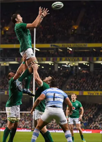  ??  ?? Iain Henderson of Ireland wins a line-out against Argentina.