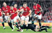  ??  ?? Rematch: Owen Farrell on the charge for the Lions against New Zealand in 2017 – Warren Gatland has suggested a one-off money-spinner next year