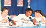  ?? Robert W Stowell Jr. / Getty Images ?? From left, Rebecca Lobo, Jamelle Elliott, and Jennifer Rizzotti, all from the University of Connecticu­t, share a laugh at a press conference after their victory in the NCAA Women’s National Championsh­ip in Storrs.