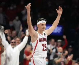  ?? Rick Scuteri, The Associated Press ?? Arizona guard Kerr Kriisa (25) reacts after defeating UCLA on Thursday night in Tucson, Ariz.