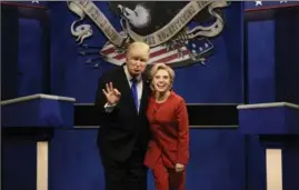  ?? THE ASSOCIATED PRESS ?? Alec Baldwin, left, as Republican presidenti­al candidate Donald Trump, and Kate McKinnon, as Democratic presidenti­al candidate Hillary Clinton, perform on “Saturday Night Live,” in New York in October this year.