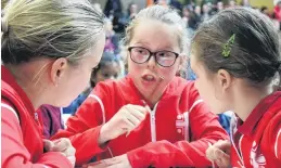  ??  ?? Discussion time . . . Annie Dowling (centre) suggests a way forward to teammates Alivia Steele (left) and Grace Farquhar (all 10), all from St John’s School team, of Ranfurly.