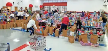  ?? Contribute­d ?? The Catoosa County Sheriff’s Office has provided Christmas toys for needy children in Catoosa for more than three decades. Last year more than 1,100 children received assistance.