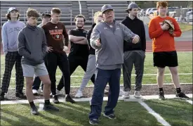  ?? MATT FREED — THE ASSOCIATED PRESS ?? East Palestine High School baseball coach Bill Sattler instructs his team during practice, March 6, in East Palestine, Ohio.