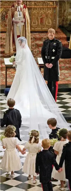  ??  ?? Wedding day: Meghan and Harry in the chapel