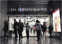  ?? NATHAN DENETTE THE CANADIAN PRESS ?? Hudson’s Bay Company said the January closure of Canadian Sears stores and HBC’s Saks Fifth Avenue luxury brand both helped it deliver a smaller overall third-quarter loss than last year.