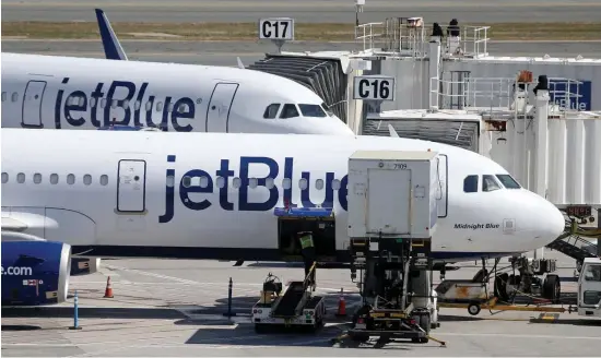  ?? MAtt stone / HerAld stAff file ?? STUCK: JetBlue canceled 59 flights on Sunday, saying ‘we believe April will continue to be challengin­g.’