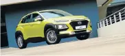  ??  ?? EYE CATCHING: its handsome but polarising looks give some character to Hyundai’s Kona crossover, while its cargo area can swallow nearly as much luggage as its Creta sibling