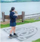  ?? Photo / Rachel Canning. ?? Small wheels are loving the new smooth surface of the wider and improved Great Lake Walkway.