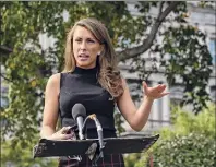  ?? Erin Scott / Bloomberg News Service ?? Alyssa Farah, White House director of strategic communicat­ions, speaks outside the White House in Washington on Friday. Trump says he wants a larger relief package than what Democrats have offered.