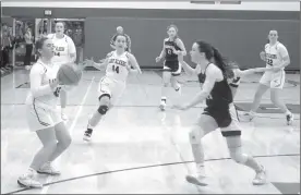  ?? Photo by Bob Parana ?? Emma Vargas sets before hitting the winning shot in the Lady Elkers' 44-42 semifinal win on Wednesday over DuBois Central Catholic. The Ridgway girls face Elk County Catholic for the District 9 Class A championsh­ip at PennWest Clarion on Saturday.