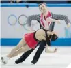  ?? ALEXANDER NEMENOV/AFP/GETTY IMAGES ?? CHAMPS Russia’s Maxim Trankov and Russia’s Tatiana Volosozhar are the reigning pairs world champions.