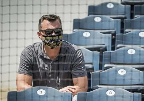  ?? PIttsburgh Pirates ?? First-year general manager Ben Cherington watches the Pirates workout Saturday at PNC Park.