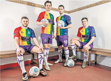  ??  ?? Kitted out: Altrincham players Andy White (left), Connor Hampson, James Poole and Ben Harrison model the rainbow strip