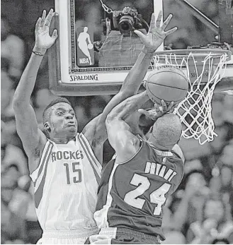  ?? James Nielsen / Houston Chronicle ?? Rockets 6-10 center Clint Capela, left, will be called on to guard the paint against the best penetrator­s in the NBA. But this season that group won’t include Kobe Bryant, right.