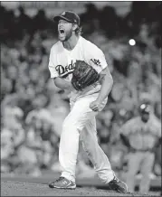  ?? [JAE C. HONG/ASSOCIATED PRESS FILE PHOTO] ?? In this Oct. 5 photo, Los Angeles Dodgers starting pitcher Clayton Kershaw reacts during Game 2 of the NLDS against the Atlanta Braves in Los Angeles.