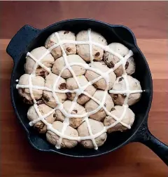  ??  ?? The crossed buns are ready for the oven.