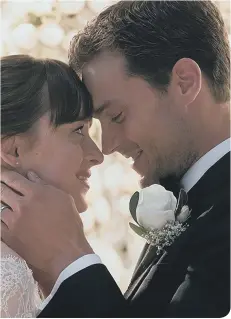  ??  ?? Jamie Dornan and Dakota Johnson in Fifty Shades Freed