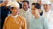  ?? — AFP ?? Myanmar’s President Win Myint and State Counsellor Aung San Suu Kyi at the Parliament on Friday.