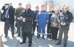  ??  ?? Russian President Vladimir Putin (front) watches the launch of unmanned Soyuz-2.1A rocket at the Vostochny cosmodrome in Amur Region, Russia. — Reuters photo