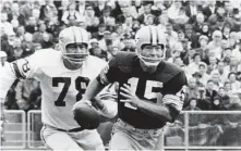  ?? Associated Press file photo ?? Green Bay’s Bart Starr (15) remains the only NFL quarterbac­k to win three consecutiv­e league championsh­ips.