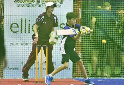  ??  ?? WINDING UP: Lawson Troy bats for Toowoomba Purple under 12s in the Queensland Junior Indoor Cricket Championsh­ips at Action Indoor Sports in Harristown. PHOTOS: NEV MADSEN