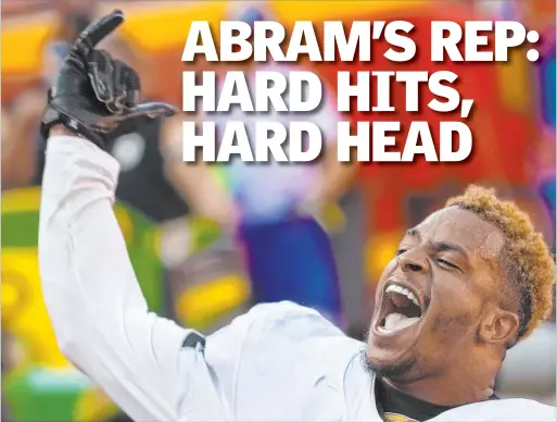  ?? Benjamin Hager Las Vegas Review-journal @benjaminhp­hoto ?? Las Vegas Raiders safety Johnathan Abram celebrates Oct. 11 after his team defeated the Kansas City Chiefs at Arrowhead Stadium.