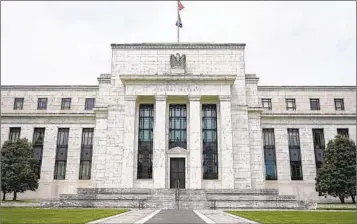  ?? PATRICK SEMANSKY AP FILE ?? After its latest rate-setting meeting ends Wednesday, the Fed will almost certainly announce that it’s raising its benchmark short-term interest rate by a half-percentage point — the sharpest rate hike since 2000.