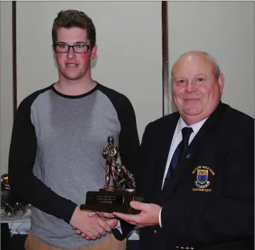  ??  ?? Wicklow Golf Club Junior Golfer of the year 2017 Luke Murphy with Captain Tony Michaels.