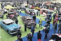  ??  ?? In their element . . . Petrolhead­s soak up the sights at Autospecta­cular at the Edgar Centre on Saturday.