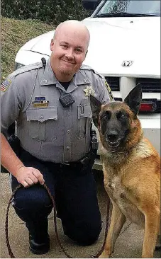  ?? PHOTO SUBMITTED ?? Cresso, K9 counterpar­t to Cpl. Tim Jeffers, was recently fitted for an armored vest to wear on patrol. Cresso is certified in Narcotics Detection and Patrol.