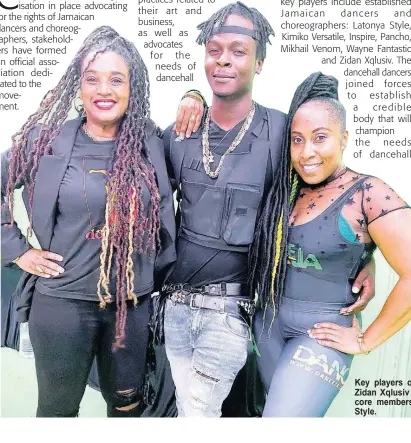  ??  ?? Key players of the Dancehall Dance Associatio­n Zidan Xqlusiv (centre) is sandwiched by beautiful core members Maria Hitchins (left) and Latonya Style.