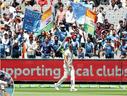  ?? GETTY IMAGES ?? Indian fans wave flags as their team completed a notable win over Australia in Melbourne. Inset, Ajinkya Rahane and Shubman Gill celebrate after hitting the winning runs.