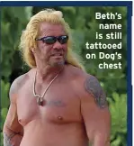  ??  ?? Beth’s name is still tattooed on Dog’s
chest