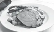  ?? RUNYON’S RESTAURANT ?? Chef Michael Brothers’ herb roasted boneless pork loin at Runyon’s of Coral Springs.