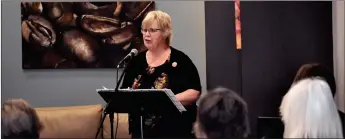  ?? ?? Peggy Worrell reads during the Prairie Quills event in Swift Current, June 2.