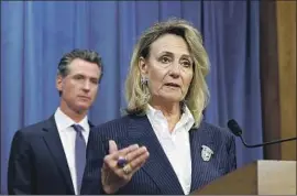  ?? Rich Pedroncell­i Associated Press ?? MARYBEL BATJER, 64, shown with Gov. Gavin Newsom in July, is a veteran of both state and federal government, serving Democratic and GOP administra­tions.