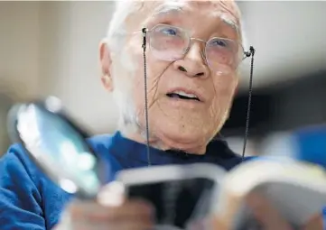  ?? EUGENE HOSHIKO/AP ?? Shuntaro Tanikawa, a Japanese poet and translator, reads one of his poems on May 25 in Tokyo.