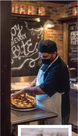  ??  ?? Reel Fish Coastal Kitchen [left]; Julian Rodriguez builds a perfect pizza at F&D [above/right]