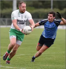  ??  ?? Cathal Hilliard (St Colmcille’s) chases Darren Hagan of St Pat’s.